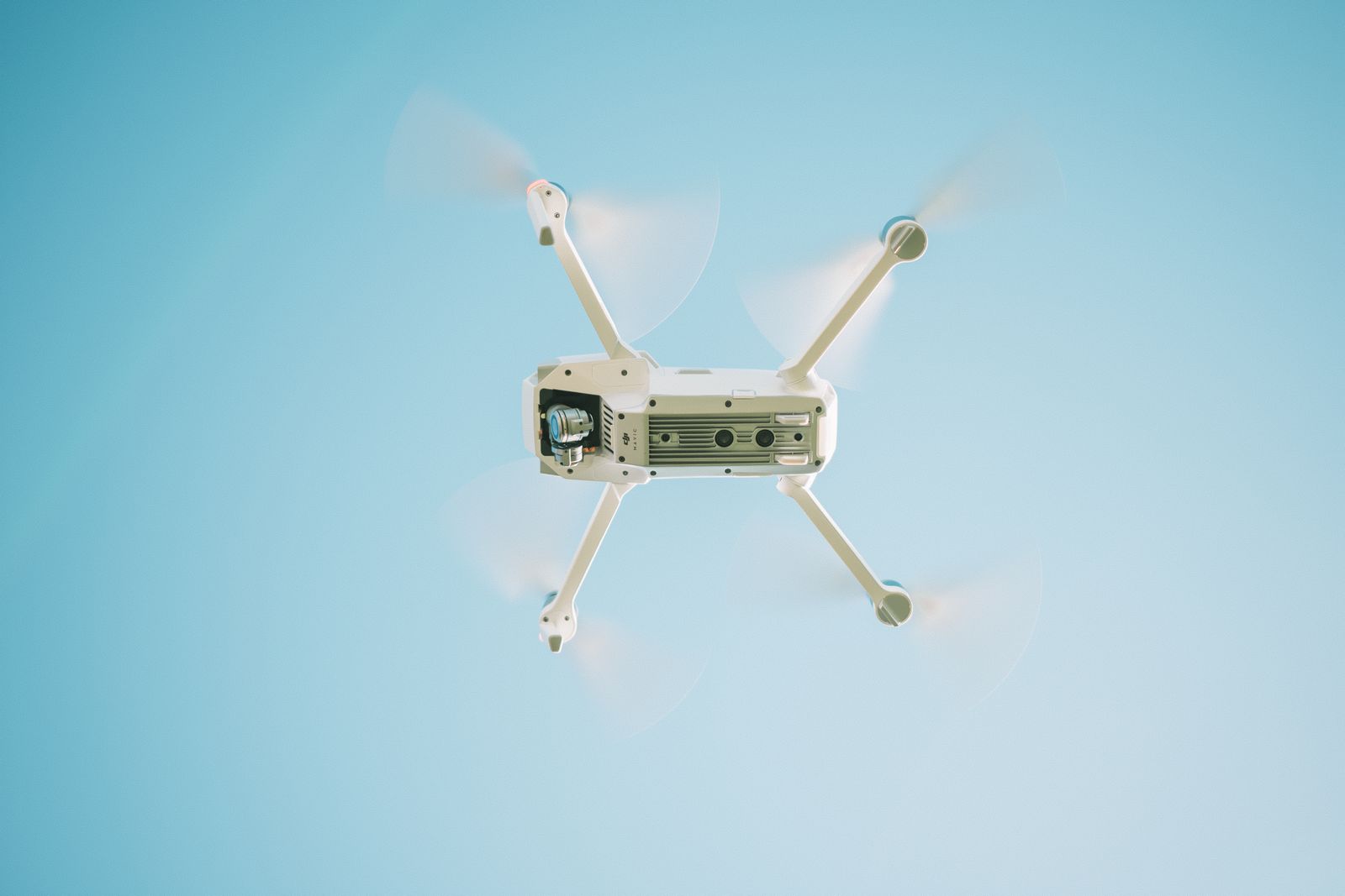 Delivery drone in flight against an open sky